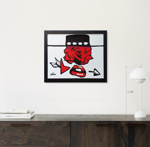 Simulated installaion of a framed acrylic painting by Mike Martinet of an arrow, a pair of red lips and an arrow head underneath a red rose and a bolero-style hat