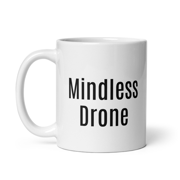 White ceramic mug with the words "Mindless Drone"